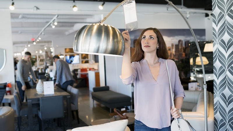 Customer checking products at shop