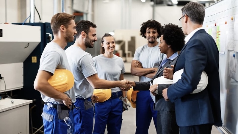 Buyer and agent meeting at factory