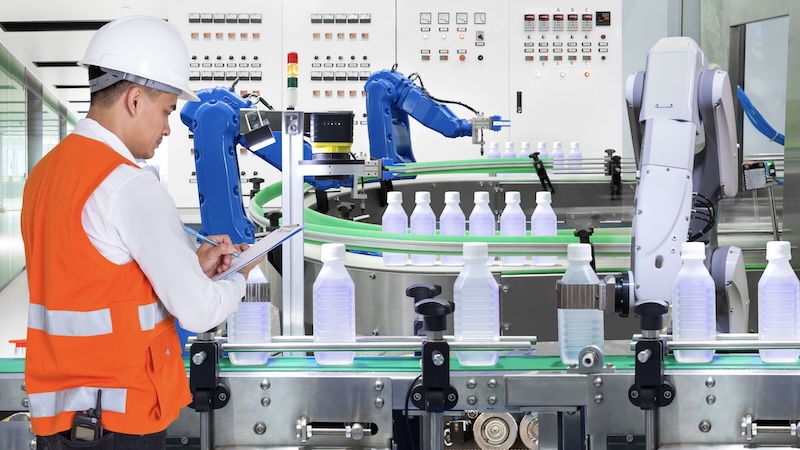 Factory quality inspector checking products