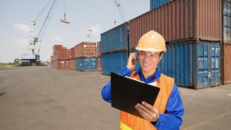 Port worker with clipboard