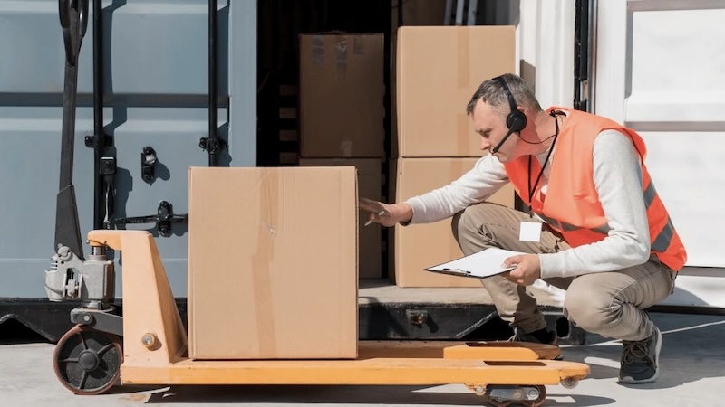 Worker checking cargo