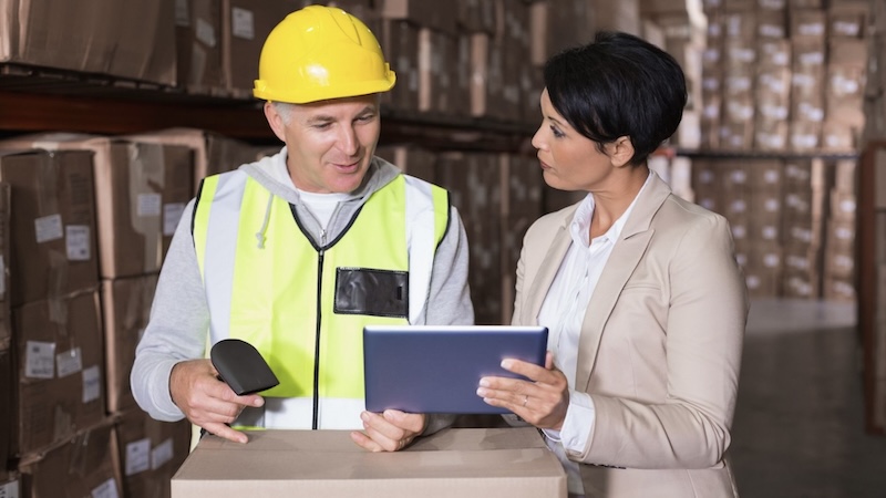 Inspector examining goods before shipment