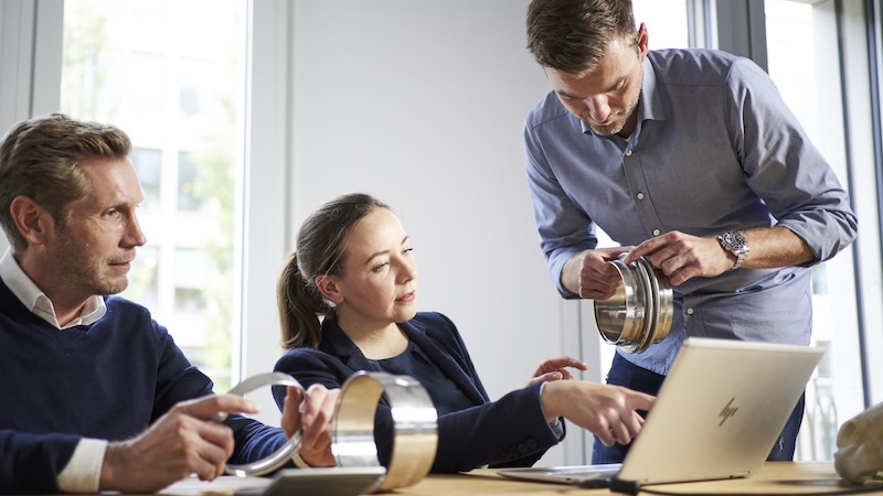 People discussing product samples