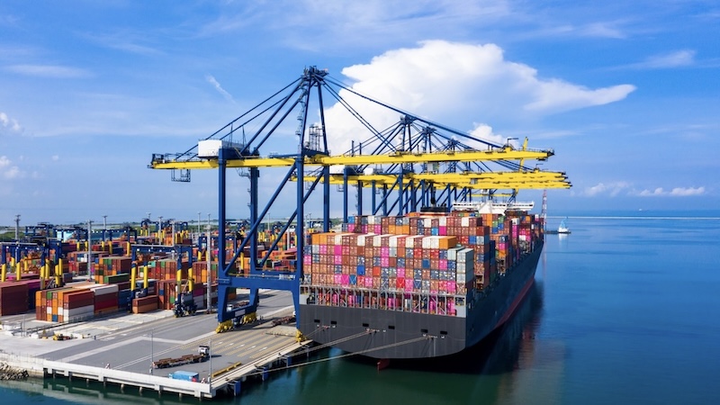 Container ship loading at port